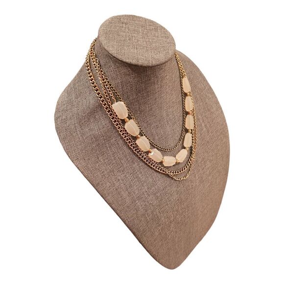 Sophia's Golden Elegance: A Four-Layered White Stone Bead Statement Necklace - Picture 6 of 10